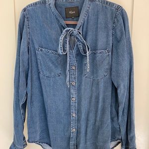 Denim shirt with feminine neck tie
